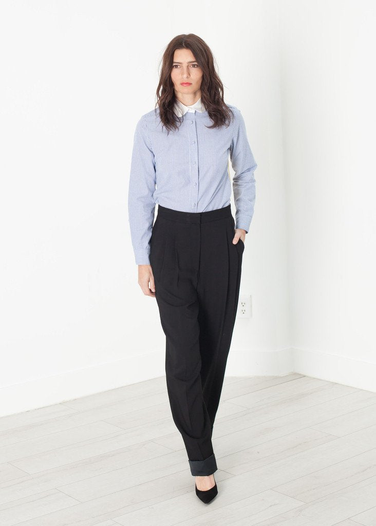 PANTALONES CON PUÑOS EN CONTRASTE EN NEGRO