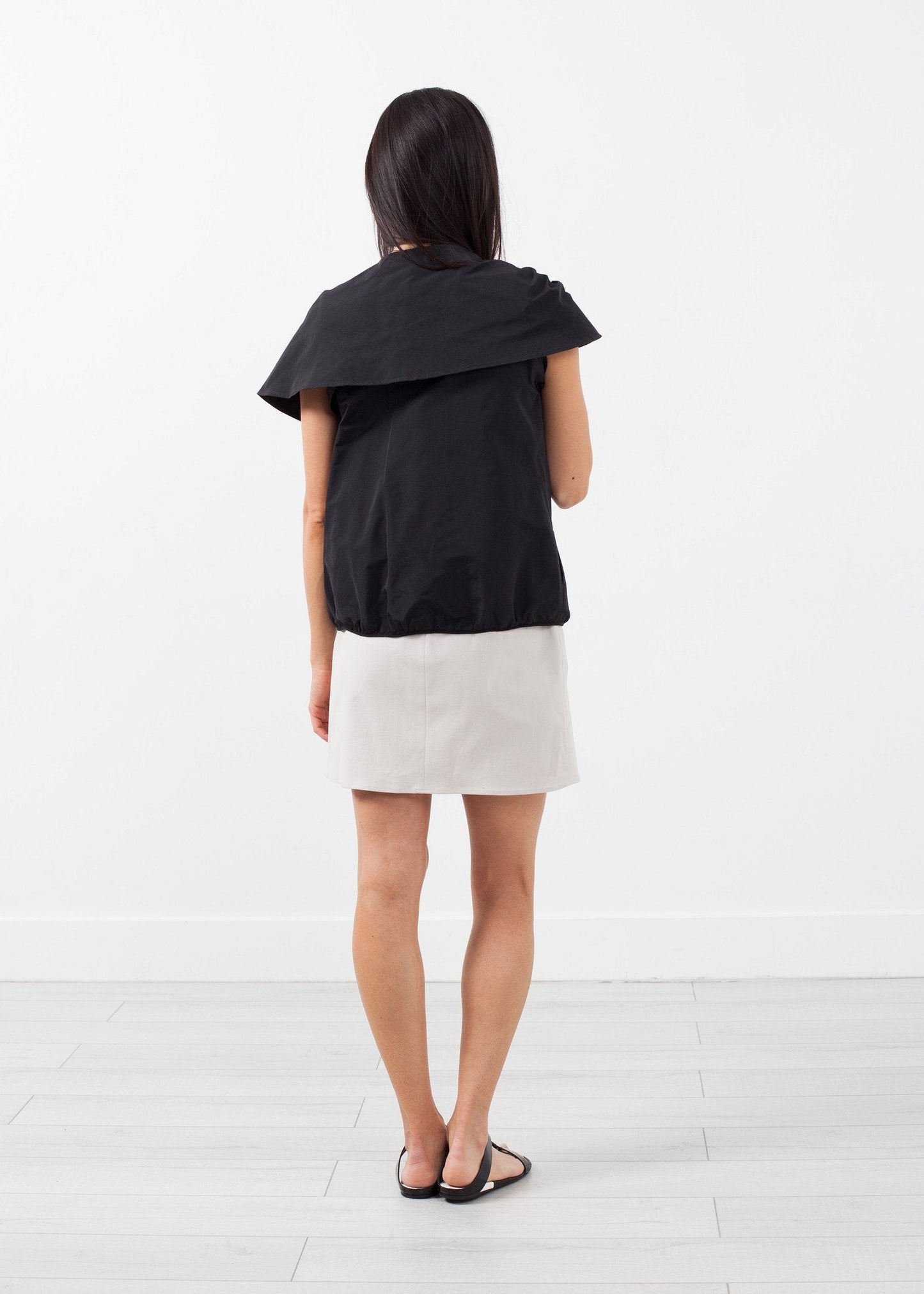 Chaqueta capa sin mangas