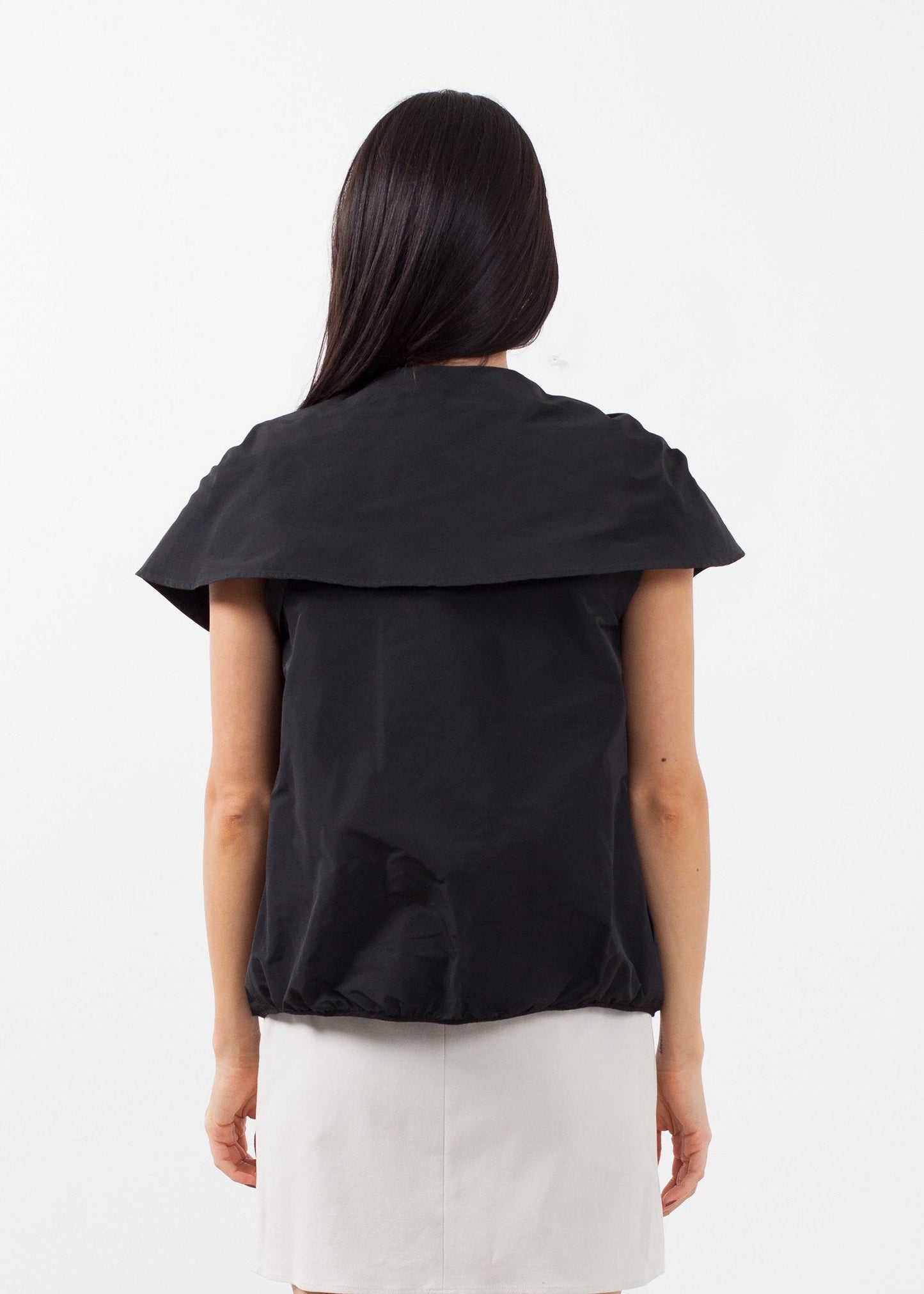 Chaqueta capa sin mangas